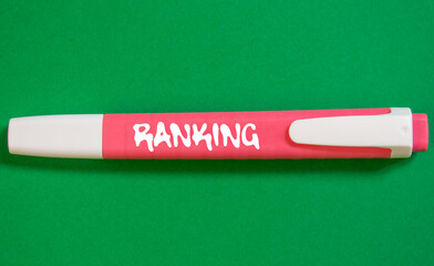 Ranking message written on pink marker pen on green background. Conceptual ranking symbol. Copy...