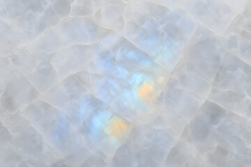 Obraz premium Moonstone crystal surface with glowing sheen and opalescent tones