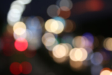 City Lights Bokeh: Captivating bokeh effect of vibrant city lights, where the soft, blurred orbs of...