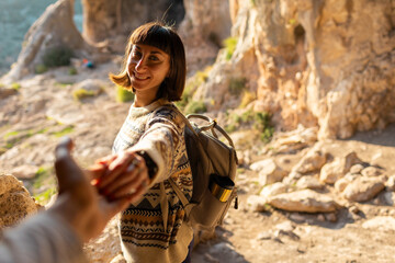 happy woman in mountains. girl traveling in mountains. trekking and hiking. girl with backpack.