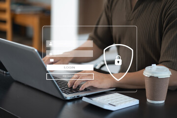 Businessman typing login and password in the concept of cyber security, information security, data...