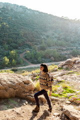 happy woman in mountains. girl traveling in mountains. trekking and hiking. girl with backpack.
