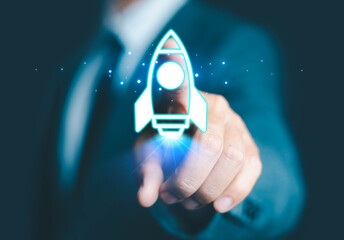  Startup business start-up with technology background as a rocket image conveying the idea of...