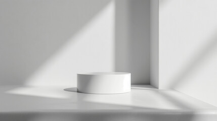 Minimalist white cylindrical object on clean surface with shadows  