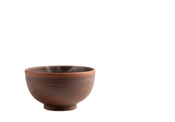 Earthenware bowl round form brown texture against a dark nearblack backdrop Steam arises from the bowls interior
