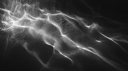 Abstract grayscale design with textured ripples.