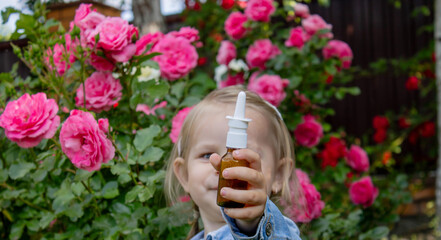 little girl allergic to roses. Selective focus