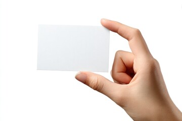 Obraz premium A hand holds a blank white card between the thumb and index finger on a white background