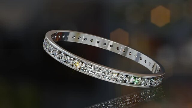 Channel set eternity ring with tiny diamonds rolling on dark glossy background. Seamless loop 3D animation.