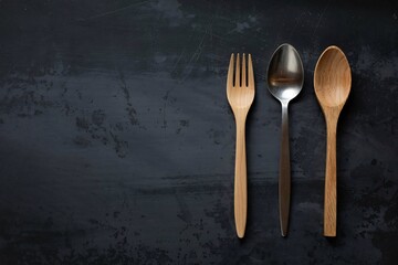 Stylish Wooden and Stainless Steel Utensils on Dark Background