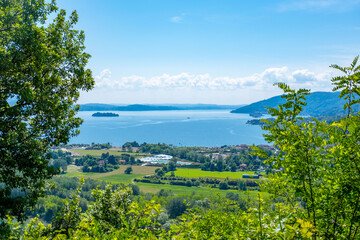 Maggiore Lake, mountains walk along Montorfano village, Hiking couple enjoying scenic mountain view, Province Verbano-Cusio-Ossola in Italian region Piedmont, Italian lakeside town
