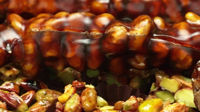 Sweet food Turkish Delight named Nut Sausage (cevizli sucuk), where the nuts are soaked in sugar syrup