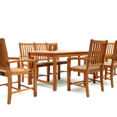A wooden table with six chairs around it