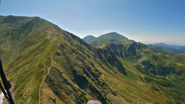 Spring Paragliding Over Alps, Proximity Flying Above Green Mountain Ridges