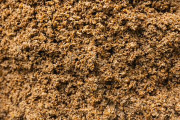 Close-up of malt grains in brewery process at beer factory