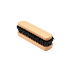 Rectangular wooden shoe brush with dense black bristles, angled view