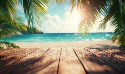 Tropical beach scene with wooden platform.  Blurred view of a sunny beach with palm trees framing the scene.  A wooden surface, positioned in the foreground, extends across the image