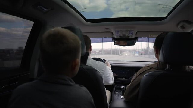 Family traveling by minivan on highway