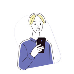 Smiling Caucasian guy with blond hair uses his smartphone for chatting