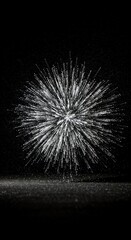 Sparkling fireworks display against black background  