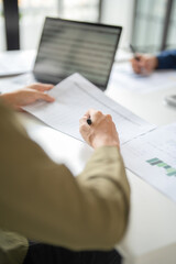 Businessmen drive online store success together.