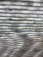 Abstract wavy lines pattern. Modern architectural texture.