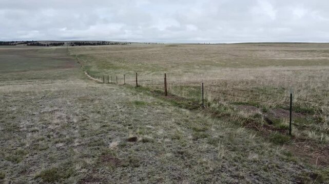 Cattle fence in wyoming landscape
