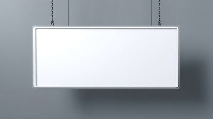 Blank white rectangular sign hanging from chains