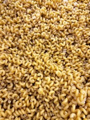 Pasta swirls in a pile top view