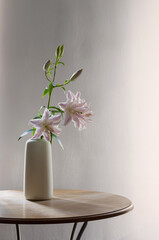pink summer flowers in vase at home