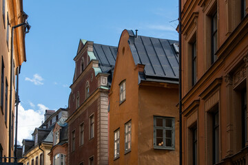 Stockholm, Sweden, historic buildings in Gamla stan (oldtown) against a blue sky