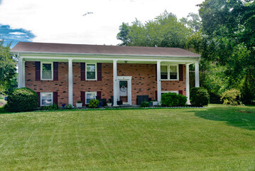 Fototapeta premium small nice brick house with columns in a village near the atlantic ocean.