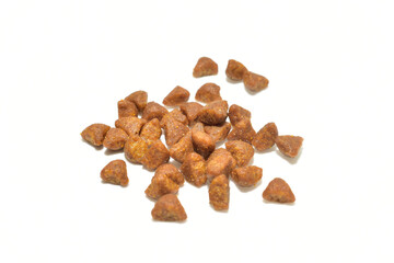 Dry cat food on a white background.