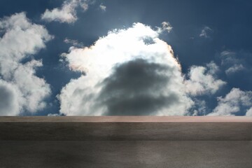Flat illustration showing concrete ledge running across sky as sunlight backlighting cumulus cloud