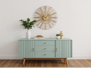 Atomic starburst clock above mint green buffet side cabinet