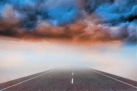 Fototapeta Digital composite image of empty road leading sky