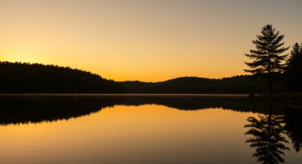 Obraz premium Golden Glow Over the Lake Nature Reflections at Dusk