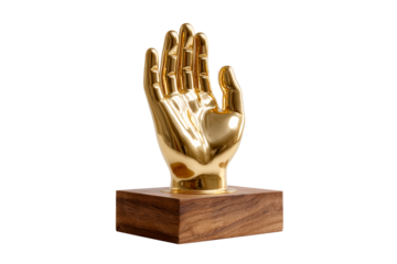 Golden hand sculpture on wooden base with transparent background