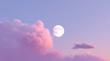 ピンク色の雲に照らされた満月の空