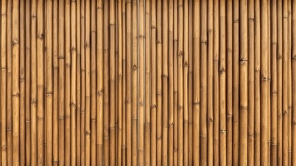 A wall of natural, uniform bamboo poles creates a visually intriguing and calming organic texture and background