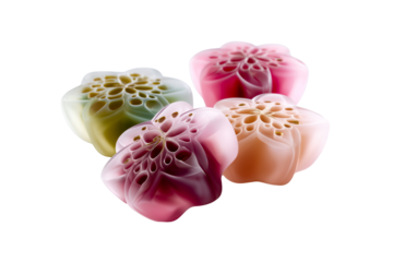 Four decorative soaps are arranged in a vibrant display