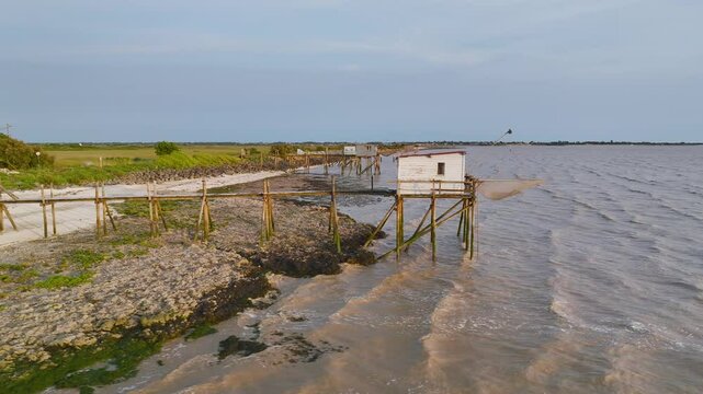 Fishing huts over Randonnee entre Histoire et Nature from a drone, Fouras, Fouras-les-Bains, Charente-Maritime, Nouvelle-Aquitaine, France, Europe	