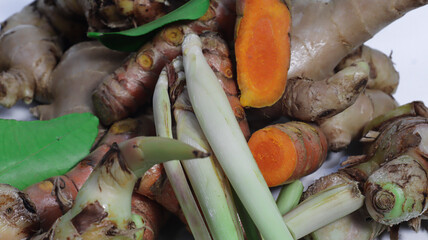 Aromatic Herbal Blend: A vibrant array of ginger, turmeric, and lemongrass create a feast for the...