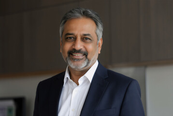 CEO, professional entrepreneur, executive manager, corporate leader, 50 years old. Successful business investor, confident in his office