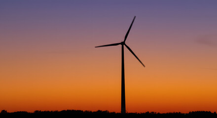 Fototapeta premium wind turbine at sunset