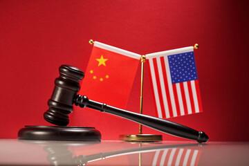 Gavel on Chinese and USA flag, Chinese and American law