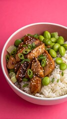 Teriyaki Chicken and Edamame Rice Bowl on Pink Background – Vibrant Asian-Inspired Food Flat Lay