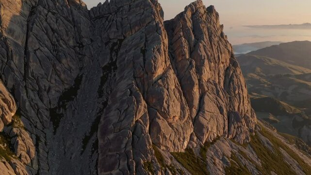 Majestic Mountain Peaks: The rugged beauty of towering mountain peaks, sculpted by time, reaching towards the heavens. The scene evokes a sense of awe, wonder, and the indomitable spirit of nature.