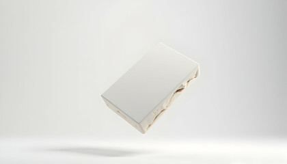 Floating Rectangular Object with Textured Base on White Background