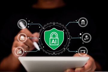 A person interacts with a tablet displaying a digital shield with a lock and 